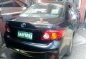 Toyota Corolla Altis 1.6 E MT 2010 Black For Sale -4