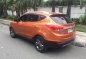 2015 Hyundai Tucson GLS 20 Orange AT for sale-0