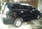 Toyota Innova 2010 AT Black SUv For Sale -0
