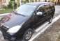 Toyota Innova V Diesel AT Black SUV For Sale -1