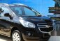 2013 CHEVROLET SPIN HATCHBACK COLOR BLACK-2