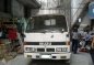 Isuzu Elf NKR Dropside 4W 4BE1 Rotary White For Sale -2