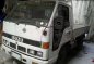 Isuzu Elf NKR Dropside 4W 4BE1 Rotary White For Sale -0