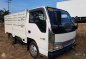 Isuzu ELF NKR 4HL1 10Ft Dropside White For Sale -0