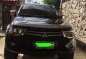 Mitsubishi Strada 2011 AT Black Very Fresh For Sale-0