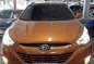 Hyundai Tucson 2014 Manual Gas Orange For Sale -10