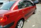 Fresh Kia Rio Matic 2009 Red Sedan For Sale -0