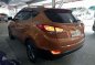 Hyundai Tucson 2014 Manual Gas Orange For Sale -1