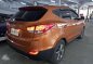 Hyundai Tucson 2014 Manual Gas Orange For Sale -2