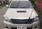 Toyota Hilux E 2014 Beige Truck For Sale -2