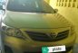 Toyota Corolla Altis 1.6E Beige Sedan For Sale -0