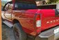 Nissan Frontier 2005 Red Pickup For Sale -0