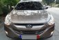 Hyundai Tucson 2012 Gasoline Automatic Brown-2