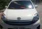 Toyota wigo 2014 e manual white for sale -0