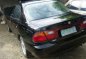 Mazda Familia 1997 Black Sedan For Sale -1