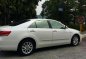 2009 Toyota Camry 2.4v AT White For Sale -0