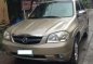 Mazda Tribute SUV 2004 Beige For Sale -0