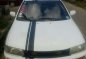 Mazda 323 Familia AT White Sedan For Sale -0