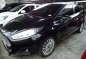 2014 Ford Fiesta Titanium A.T. Sedan-0