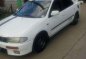 Mazda 323 Familia AT White Sedan For Sale -2