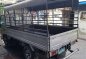 2007 Isuzu Nhr Dropside 10ft. With canopy-6