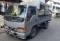 2007 Isuzu Nhr Dropside 10ft. With canopy-9