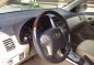 Toyota Altis 2011 1.6 V variant, pearl white.-3