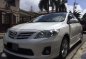 Toyota Altis 2011 1.6 V variant, pearl white.-2