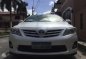 Toyota Altis 2011 1.6 V variant, pearl white.-8