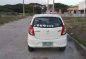 Suzuki Alto Deluxe 2014 acquired top of d line-5