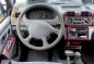 2001 MITSUBISHI ADVENTURE GLS : MT . all power . gas . dual ac . fresh-1