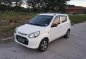 Suzuki Alto Deluxe 2014 acquired top of d line-1