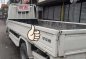 2002 Isuzu Elf Dropside White Truck For Sale -0