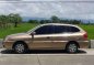 Kia Rio Family Wagon 2004 Golden For Sale -0