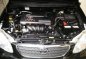 Toyota Corolla Altis J 2005 MT Black For Sale -5