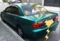 1997 Mazda 323 AT Green Sedan For Sale -1
