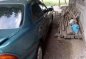 mazda 323 1997 Green sedan for sale -0