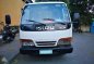 Well maintained Isuzu Elf Truck - Dropside Body For Sale -0