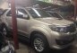 2014 TOYOTA Fortuner 25 G 4x2 Autoamtic Silky Gold-0