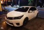 Toyota Altis 1.6V AT.pearlwhite 2015-2