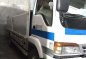 2004 Isuzu Forward Dropside 6HE1 For Sale -1