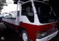 ISUZU ELF 4HG1 Dropside with aircon-0