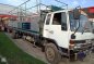 Isuzu Forward dropside 8 studs 26ft long-0