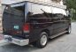 2011 Ford E150 Black Captain seats-1