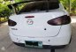 Mazda 2 2010 15 AT White Sedan for sale-6