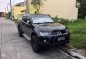 2009 Mitsubishi Strada GLX 4x2 Manual Transmission Black Mica-1