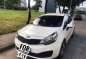 Rush KIA RIO 2013 MT Pearl White Sedan-1