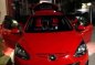 For sale Mazda 2 red hatch back Model 2011-1