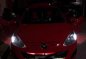 For sale Mazda 2 red hatch back Model 2011-4