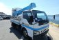 2005 Isuzu Elf CBU Manlift 4HL1 Aichi 10Meter-1